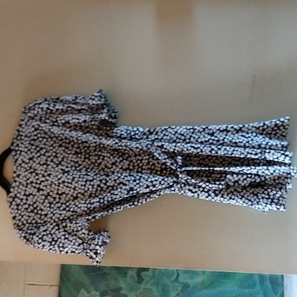 Short sleeved wrap around dress ties in the back. - Picture 2 of 5